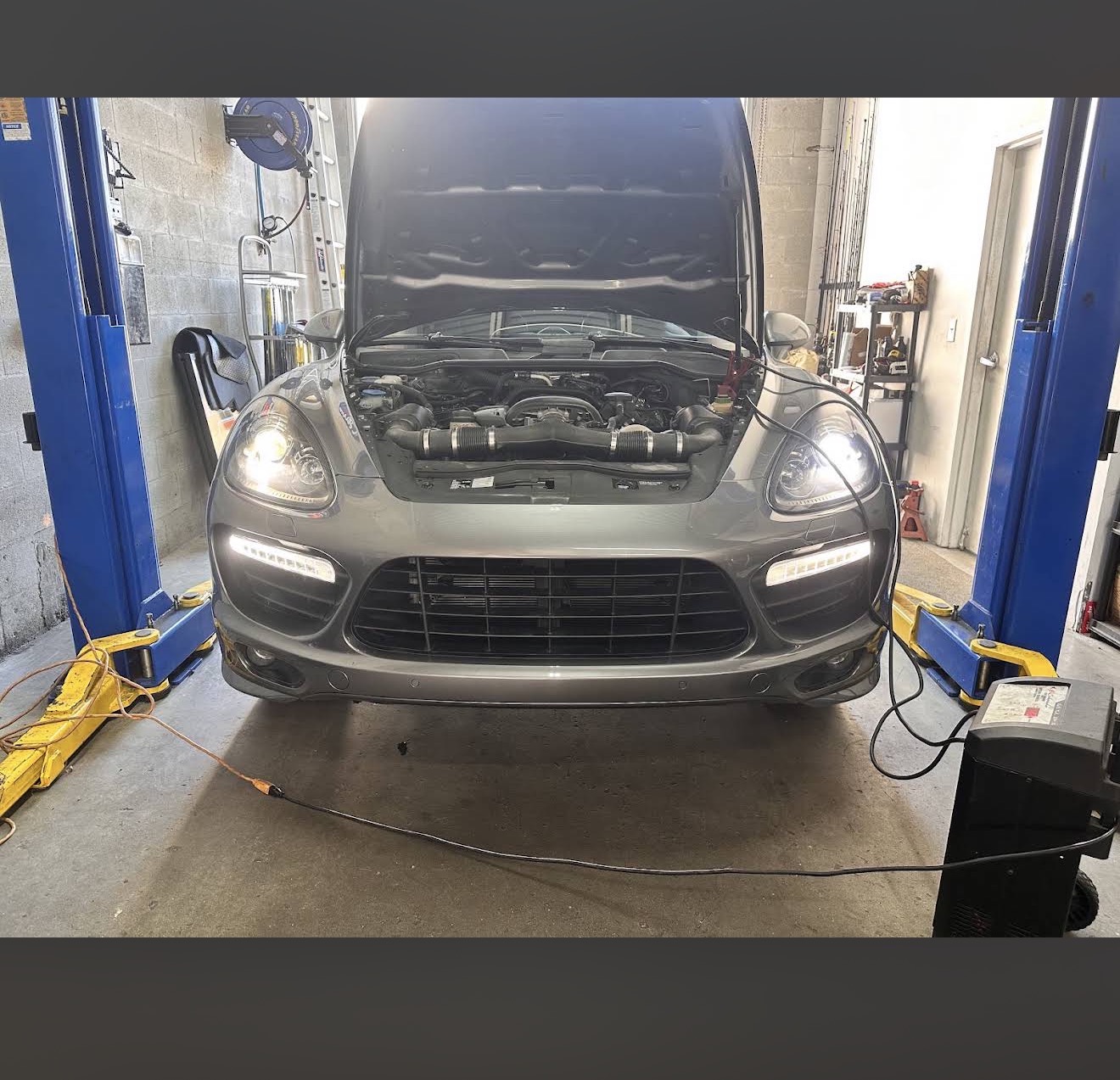 Vehicle being serviced inside Adrian’s Auto Repair in Cape Coral
